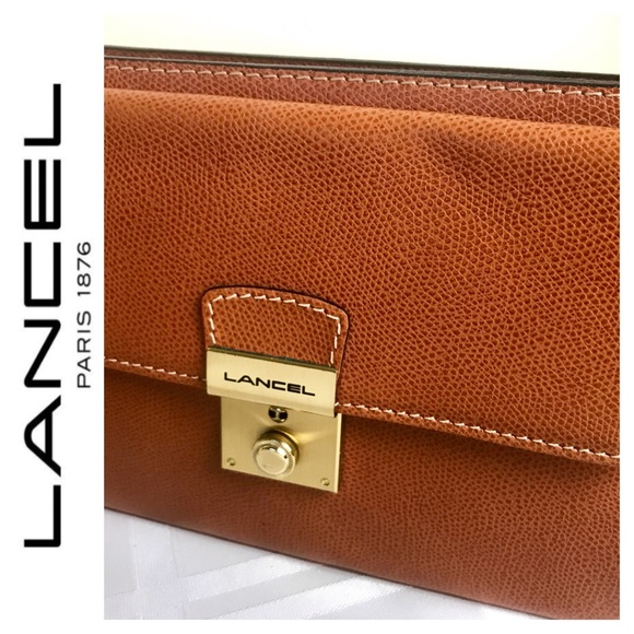 Lancel Handbags - NWOT Lancel Signature Leather Clutch Wristlet